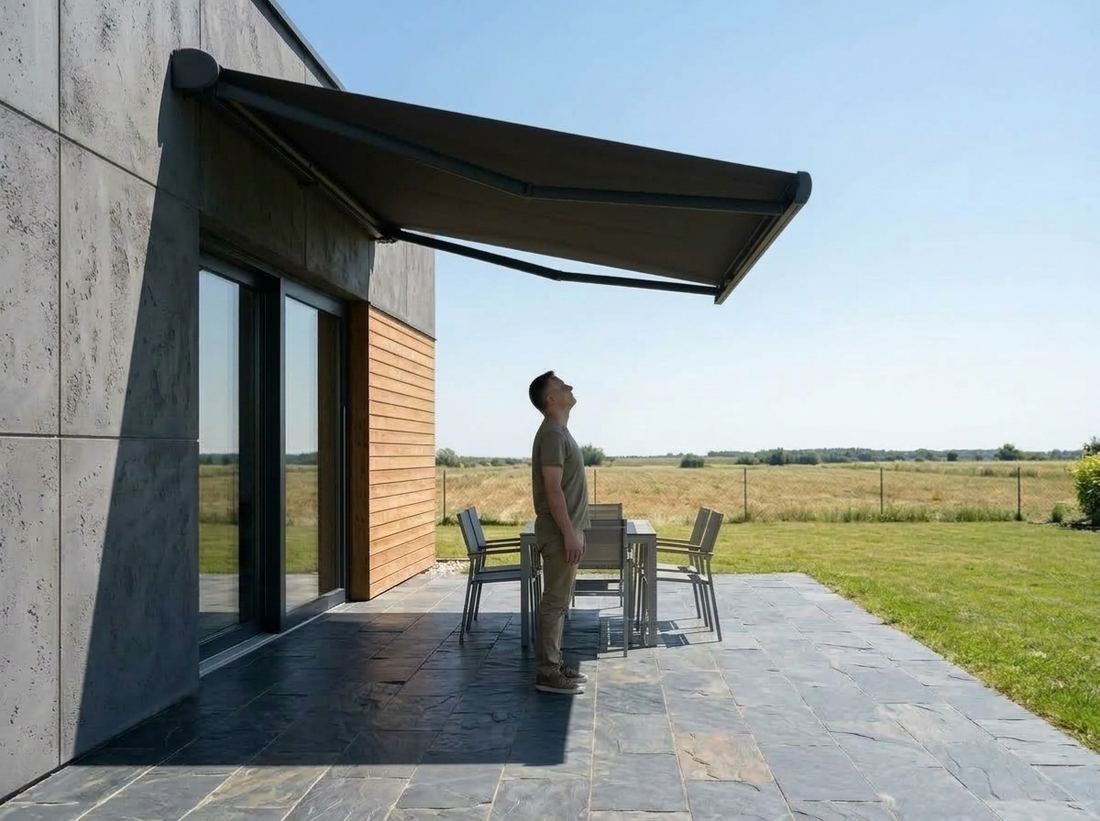Retractable awning fitted with the sun and wind sensor on an Australian home